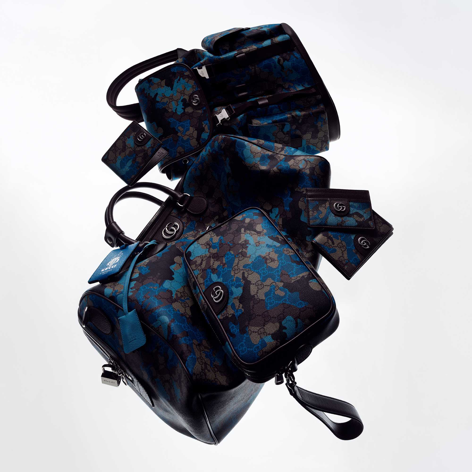 Blue camouflage and GG Gucci bags