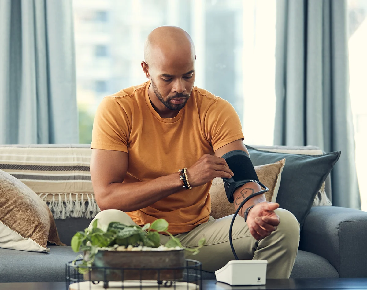 iStock-1201417258 - Man checking blood pressure at home