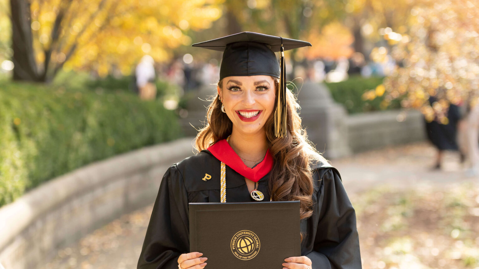 Lisa Holman learned how to balance her career at a credit union and lifelong passion for music, all while graduating with honors from Purdue Global. (Purdue University photo/John Underwood)