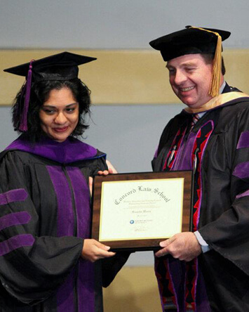 Somita receives an award during the Concord Law School graduation ceremony. (Photo provided by Somita Basu)