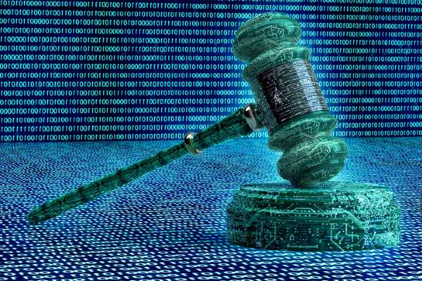 gavel with source code in background