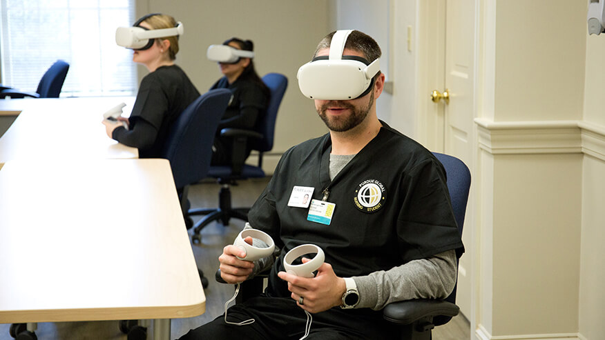 Purdue Global nursing students practice virtual reality clinicals using Meta Quest headsets.