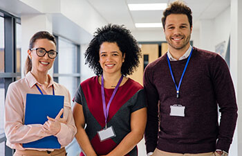 Group of people standing in hallway