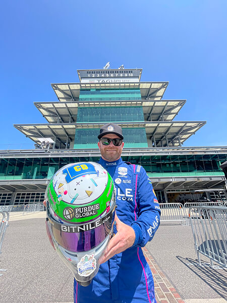 Conor Daly, driver of the No. 20 Ed Carpenter Racing entry for Sunday’s (May 28) Indianapolis 500, will carry the Purdue Global logo with him on his helmet as he goes for the checkered flag. 
