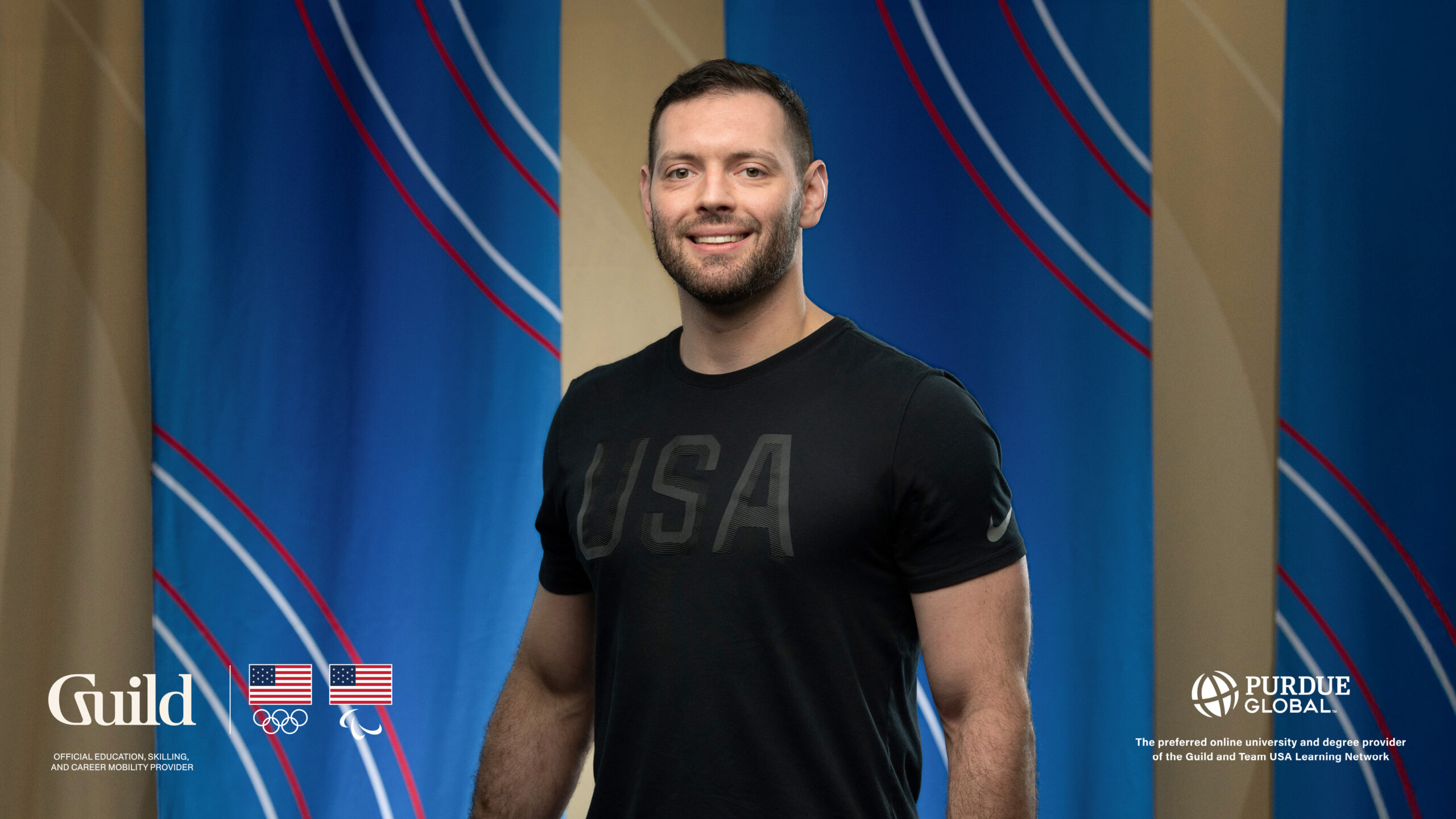 Kell Berliner wearing a T-shirt that reads USA.