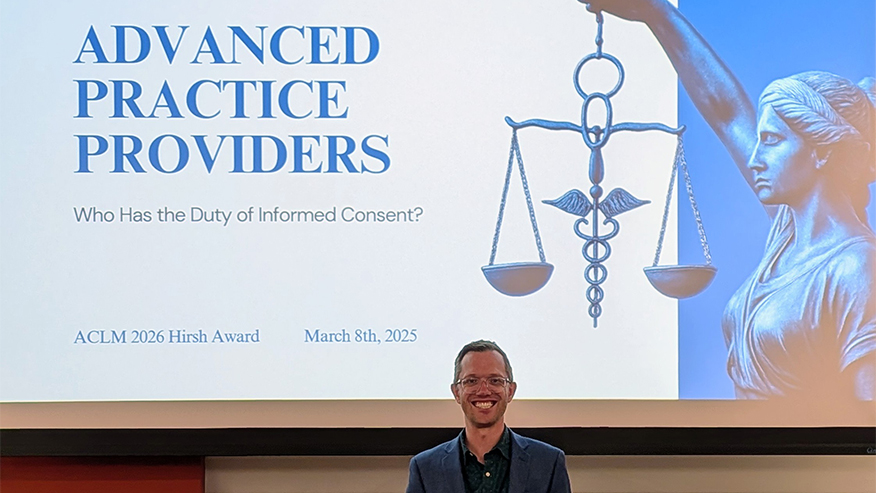 A Purdue Global Law School student at a conference.