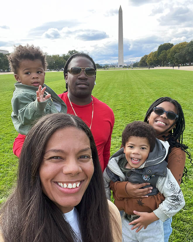 Nicole Richardson Hicks with her family in front of the Washington Monument. (Photo provided)