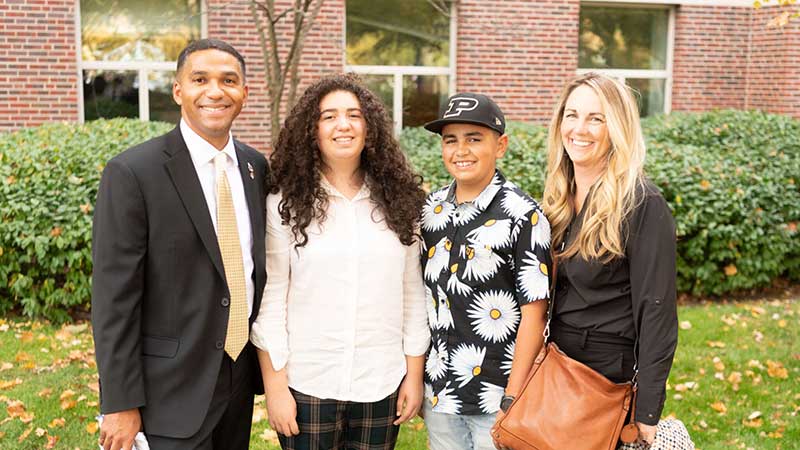 Kelvin Gumbs’ children Gladys and Frankie and wife Mandy accompanied him to West Lafayette when he came to address the graduates at Purdue Global’s October 2022 commencement. (Purdue University photo/John Underwood)