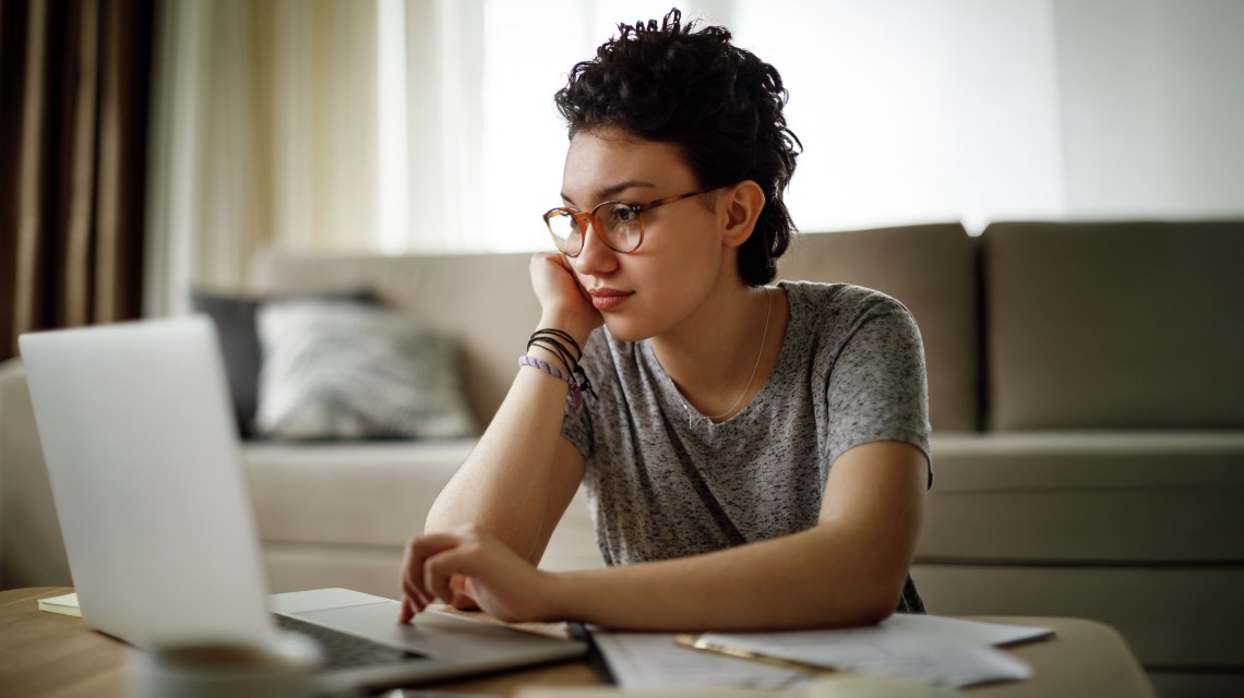 An online college student working on her homework.