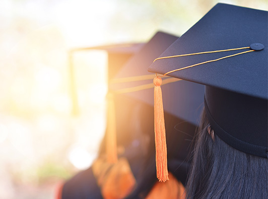 Graduates in cap and gown