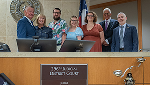 Family and friends, including Dean Martin Pritikin (far right), join Nelson A. Locke (far left) for his admission ceremony. (Photo provided by Sherry Sutton)