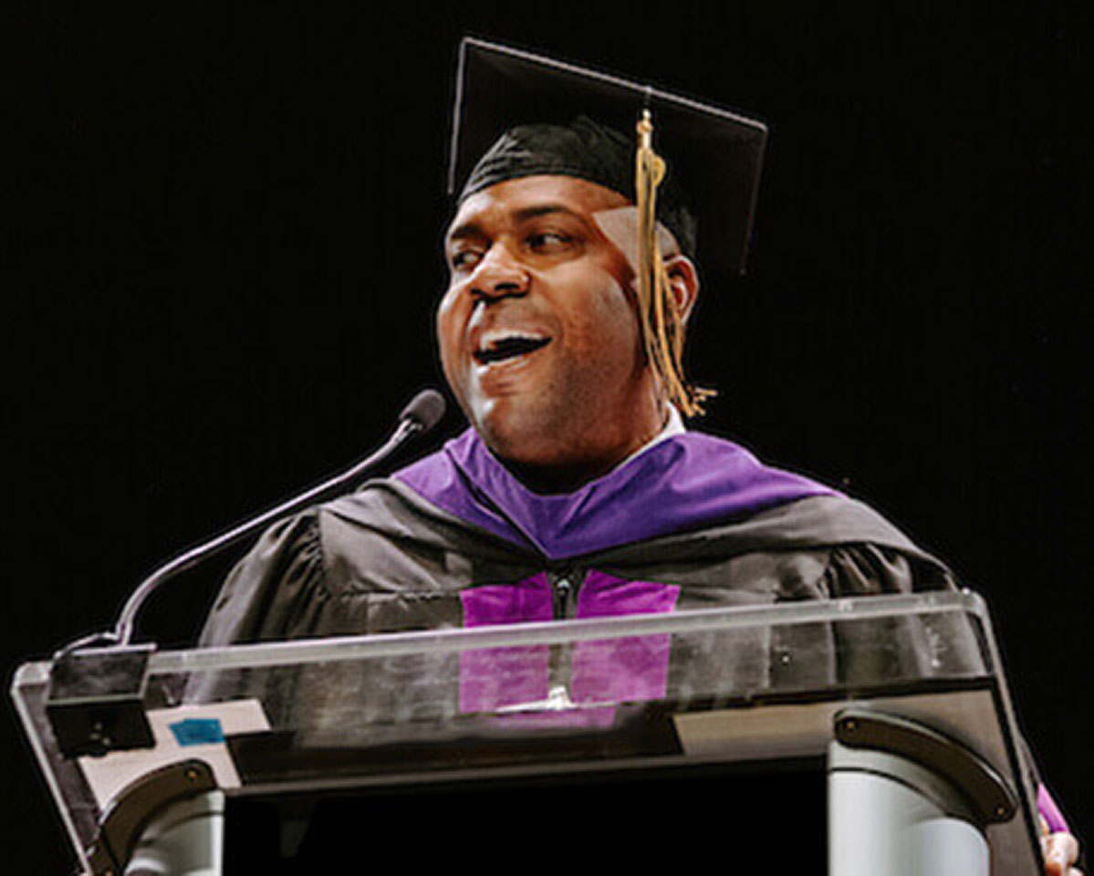Graduate speaking at graduation