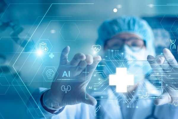 A health care worker wearing a surgical mask stands in front of a screen representing AI