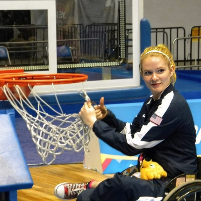 Hollermann celebrates by cutting down the net after an important win. (Photo provided)