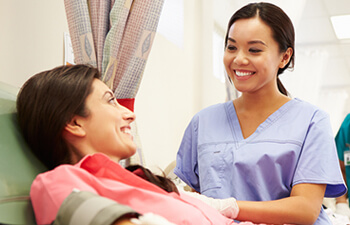 nurse helping a patient