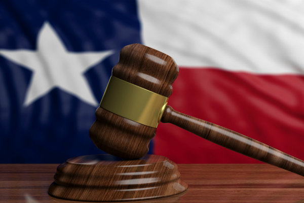 Flag in background with gavel in foreground