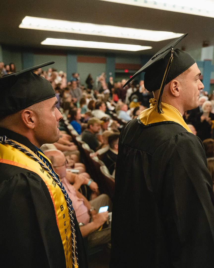 Massimo Ruzza and Gabe Giusti were among the 1,177 Purdue Global graduates who took part in in-person and virtual commencement ceremonies at Purdue’s Elliott Hall of Music on Oct. 22. (Photo by Charles Jischke for Purdue University)