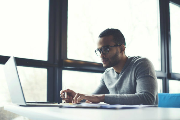 Man looking at laptop computer