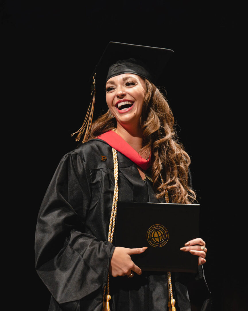 Along with Purdue Global courses, Holman’s schedule was filled with work and practices with her band, Laura Velvet. (Purdue University photo/John Underwood)