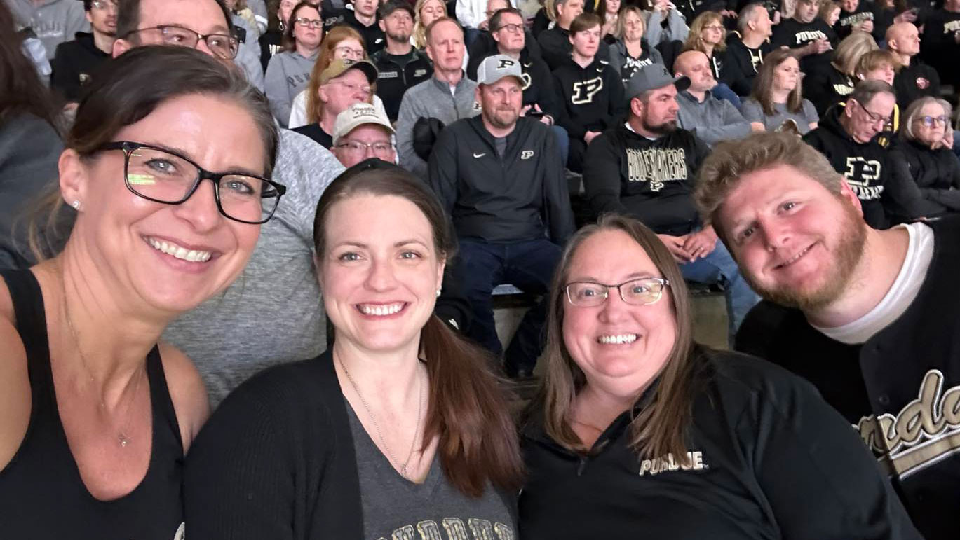 Making time for fun: One of Rawles’ mid-tax season outings with colleagues and family was a basketball game at Mackey Arena. (Photo provided)