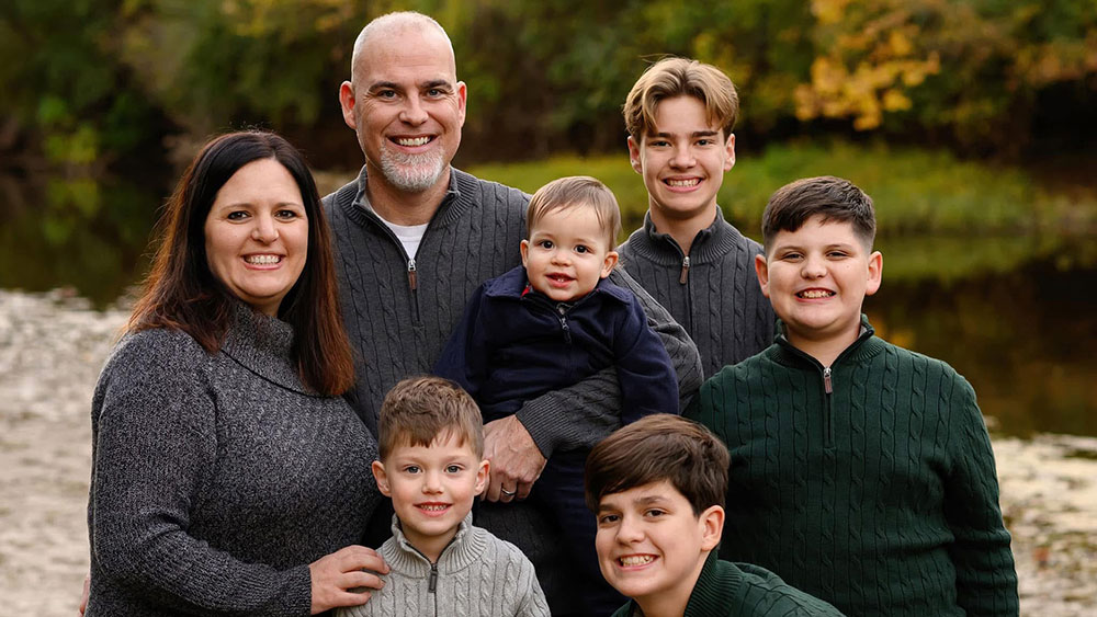 Cornelius and her husband with their five boys. Their youngest son arrived right after her final class was complete. (Photo provided)