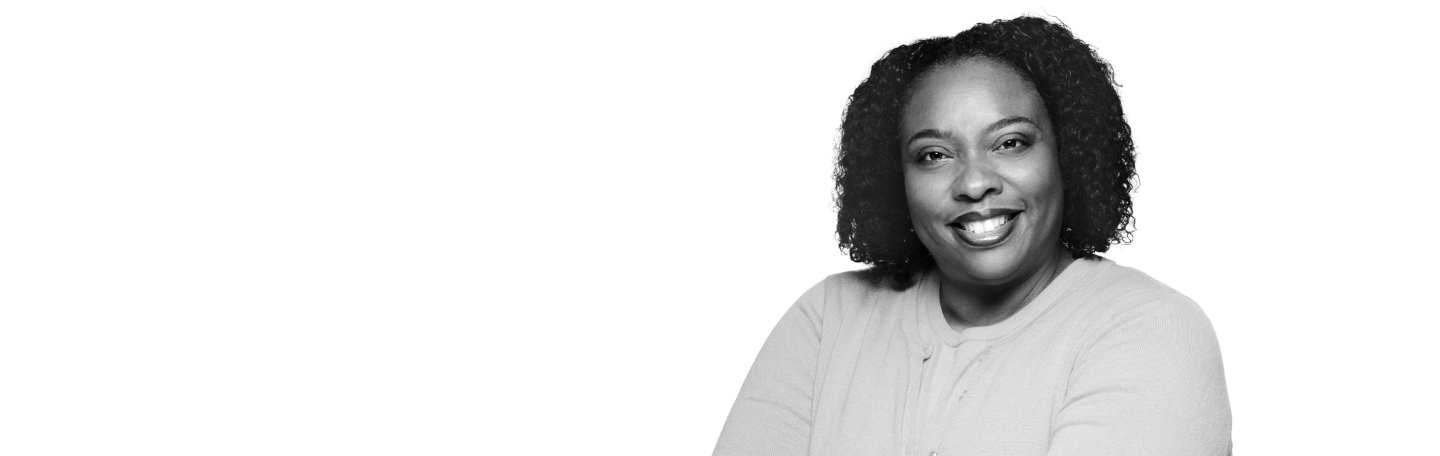 black and white image of Purdue Global graduate on white background