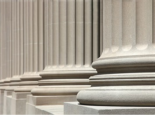 close-up of columns outside a judicial building