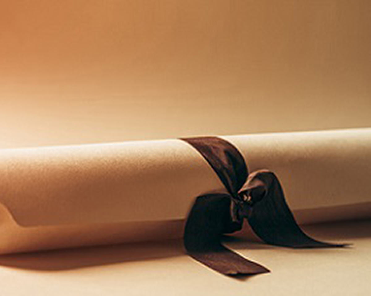 a diploma wrapped in ribbon