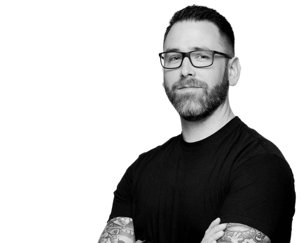 black and white image of Purdue Global graduate Justin