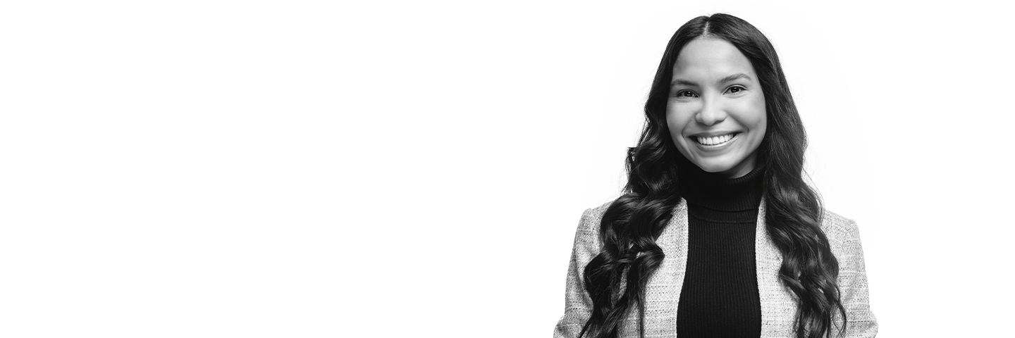 black and white image of smiling Purdue Global student