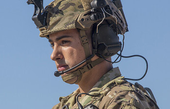 Man in military uniform and headset