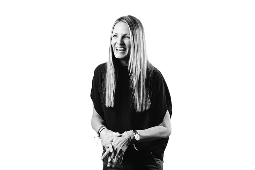Gaytanna McGuire laughing in a black and white photo