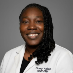 A nurse practitioner in a white lab coat.