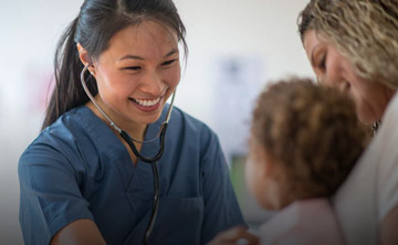 Healthcare worker checking patients