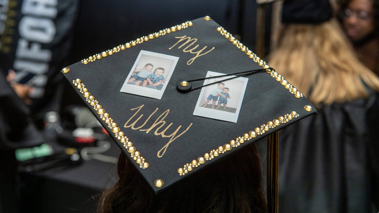 A May 2022 Purdue University Global graduate’s cap decorations reveal her motivation for completing a college degree. (Purdue University photo/John Underwood)