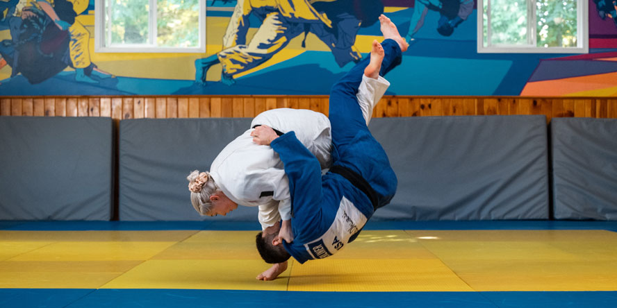 Stout-Berliner grapples with her husband, Kell Berliner, another Team USA hopeful. (Photo credit: Purdue Global)