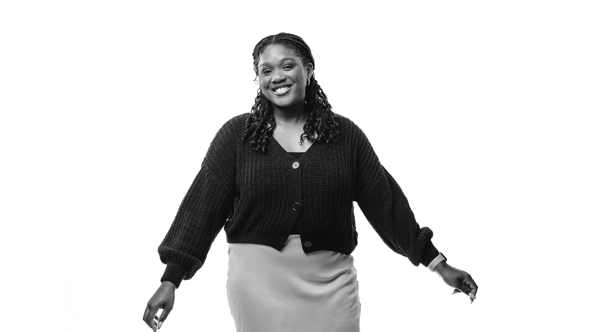 Black-and-white photo of Cassidy Burrell smiling to camera.