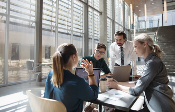 group of professionals meeting in an office