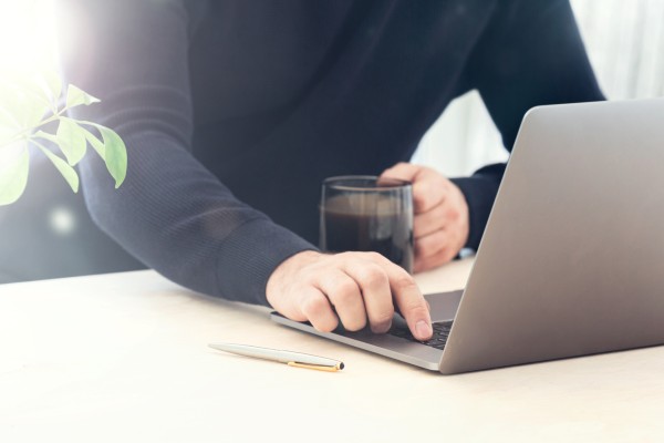 Person at a laptop reading