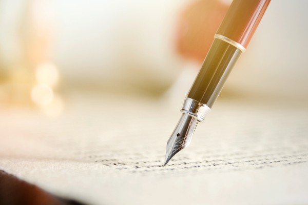 Close-up of fountain pen on paper