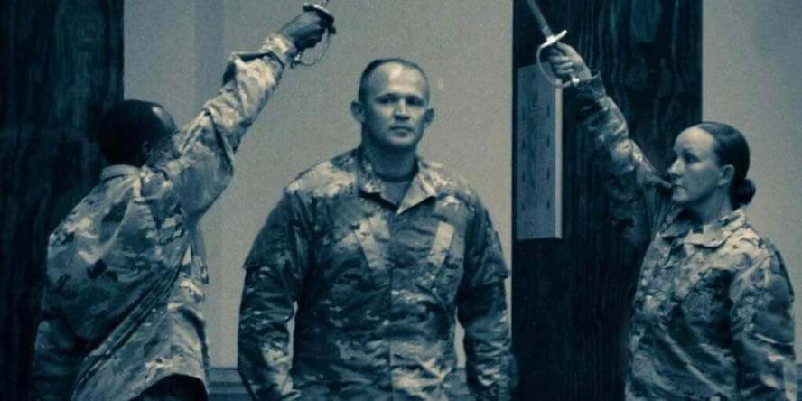 Dustin’s NCO induction ceremony — he rose in rank quickly and became a non-commissioned officer after only three years in the Army. (Photo provided)