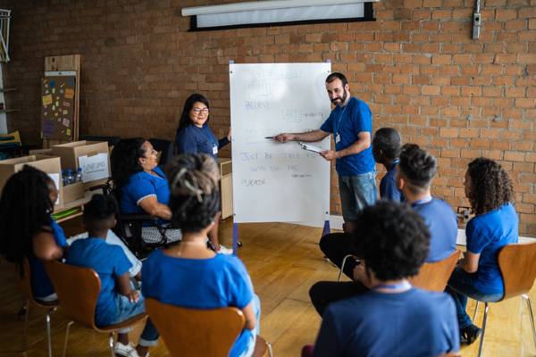 Community health worker talking in a meeting at a community center