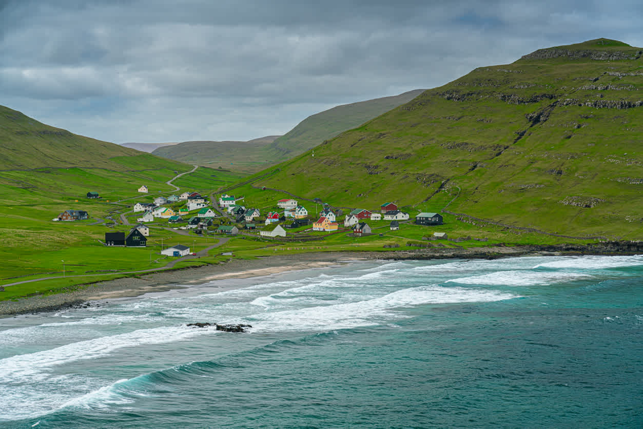 Husavik village near the coast in Sandoy island