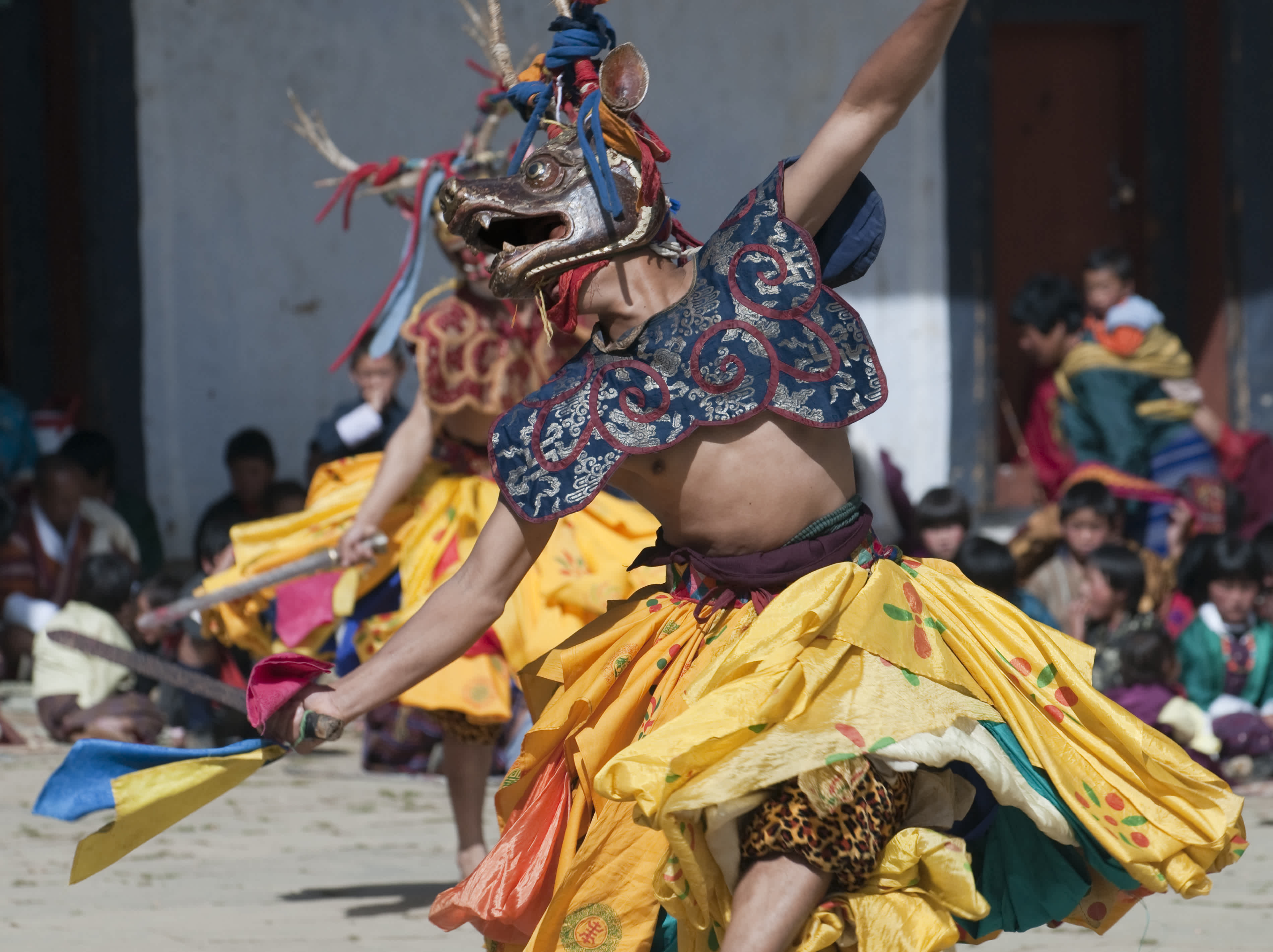 Culture in Bhutan: Dancers at Bhutanese Tshechu Festival