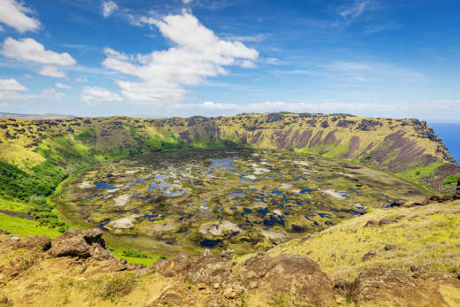 Photo of Rano Kau Volcano Crater Lake under blue summer sky