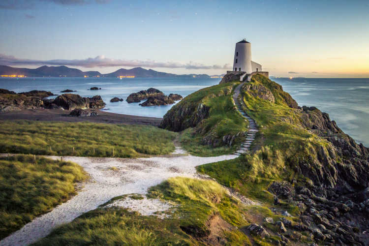 Discover the beautiful rugged Welsh coastline, pictured here, on a Wales vacation