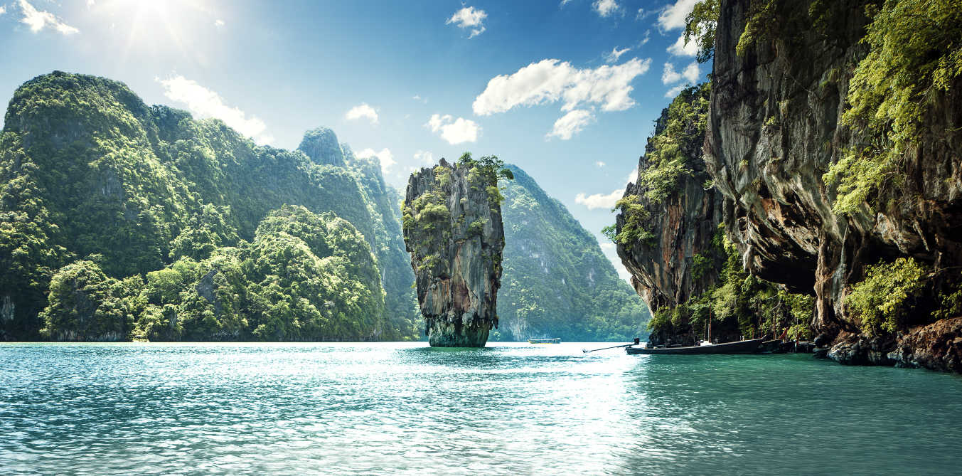 Asia, Thailand, Phang nga national park, Koh tapu rises from turquoise waters.