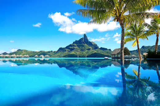 View of the blue sea of Bora Bora and Mount Otemanu, the highest point of the island