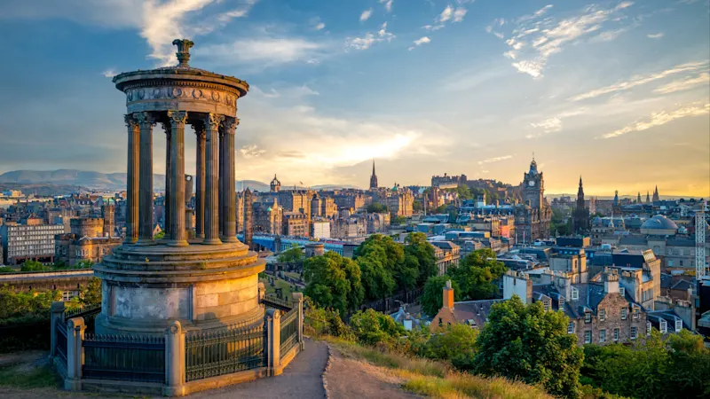 Europe, Scotland, Edinburgh cityscape as seen from Calton Hill at dusk.