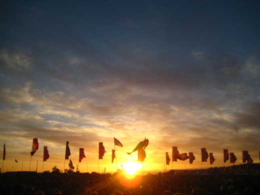 Sunset over Glastonbury festival in England.